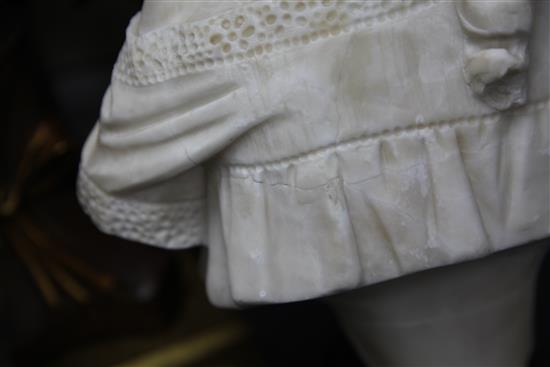 A late Victorian carved alabaster bust of a young girl holding a rose, 19in.